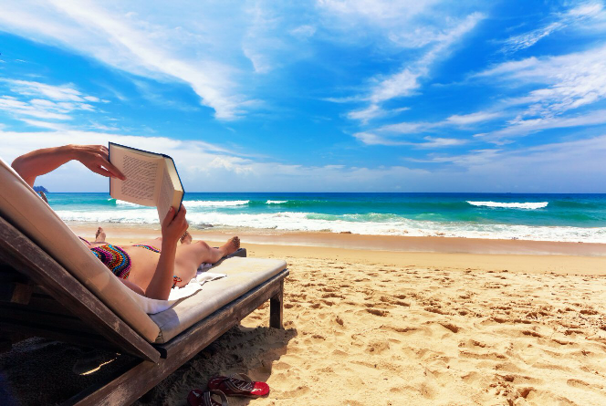 Relaxed Healthcare business Owner Reading on Lounger